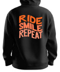 Black Ride, Smile, Repeat Torq MTB pullover hoodie with front logo and casual fit, perfect for mountain biking enthusiasts.