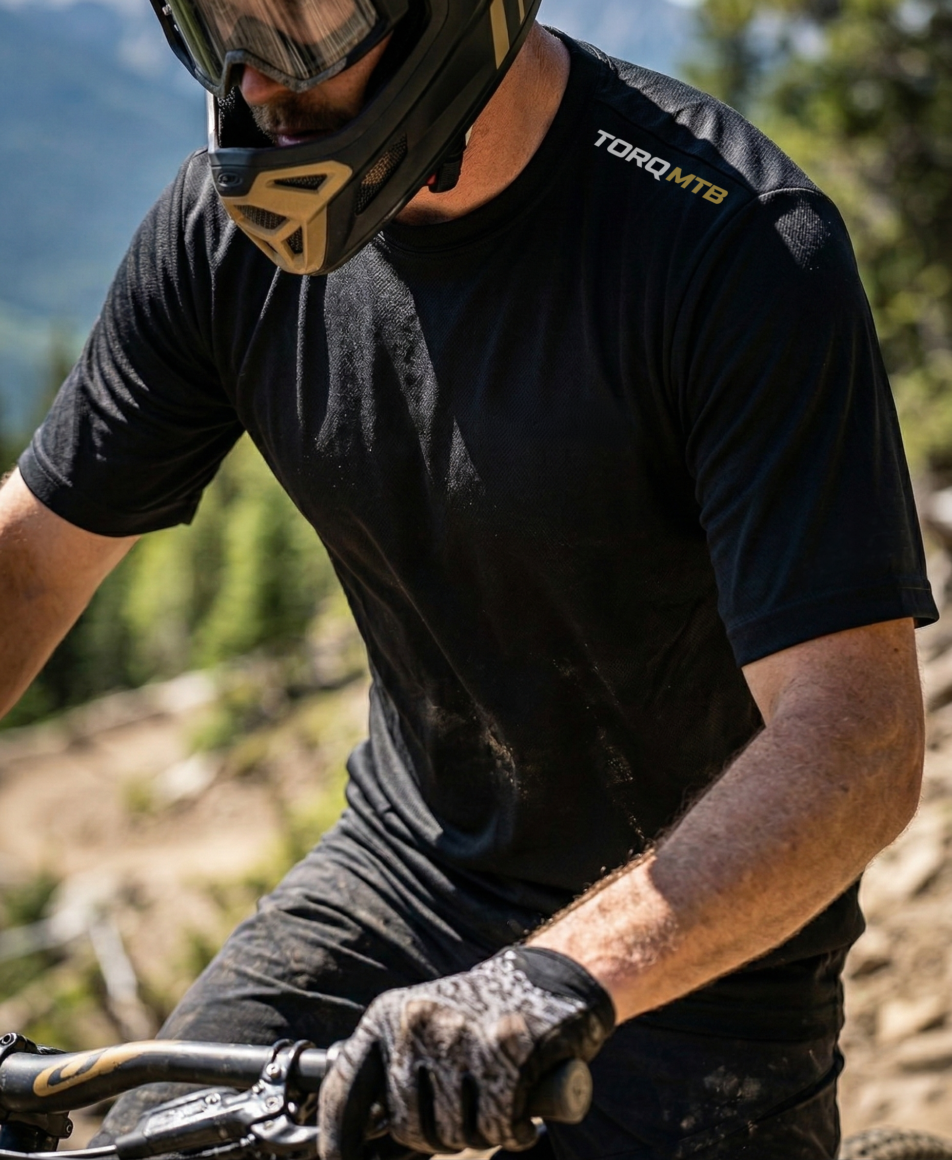 Topo The World graphic tech jersey by Torq MTB Apparel, featuring a colorful mountain map design on a lightweight cycling jersey.